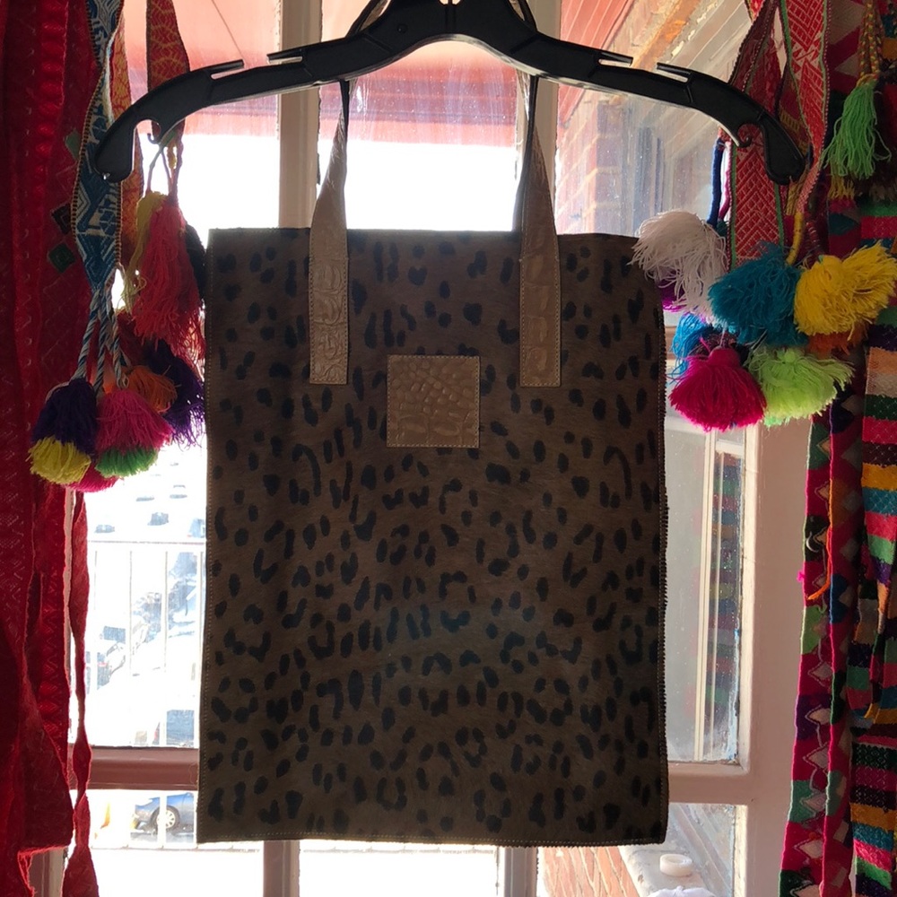 Cowhide shoulder totes
